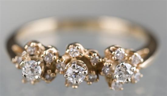 Appraisal: KT yellow gold lady's diamond ring Ring has clusters of