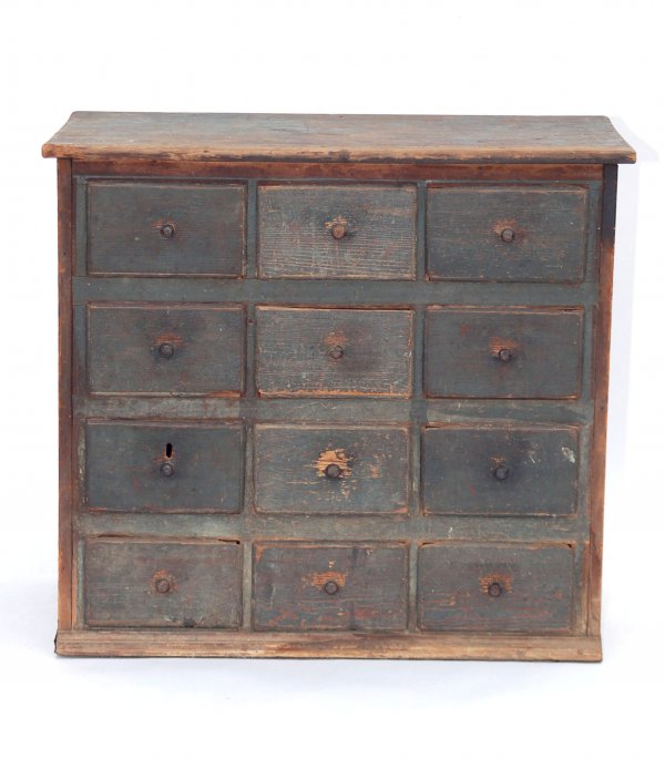 Appraisal: Painted apothecary chest Worn green painted finish Four sets of