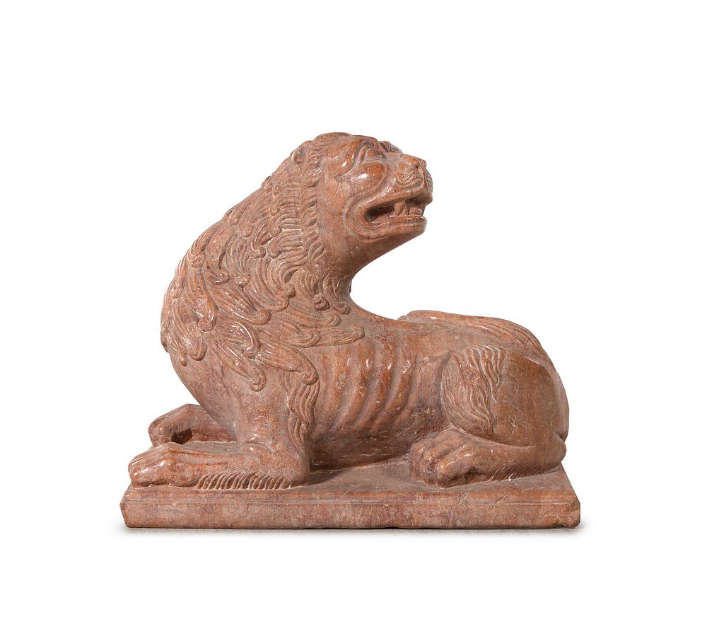 Appraisal: A Continental Carved Figure of a Recumbent Lion A Continental