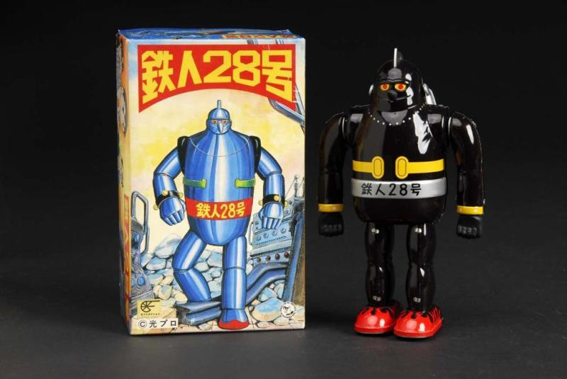 Appraisal: Tin T- Tetsujin Robot Wind-Up Toy Description Japanese Includes original