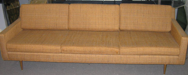 Appraisal: R J ROBINSON-JOHNSON 'S tweed upholstered sofa with round tapering