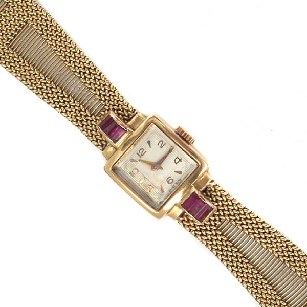 Appraisal: A lady's retro ruby and k yellow gold bracelet wristwatch