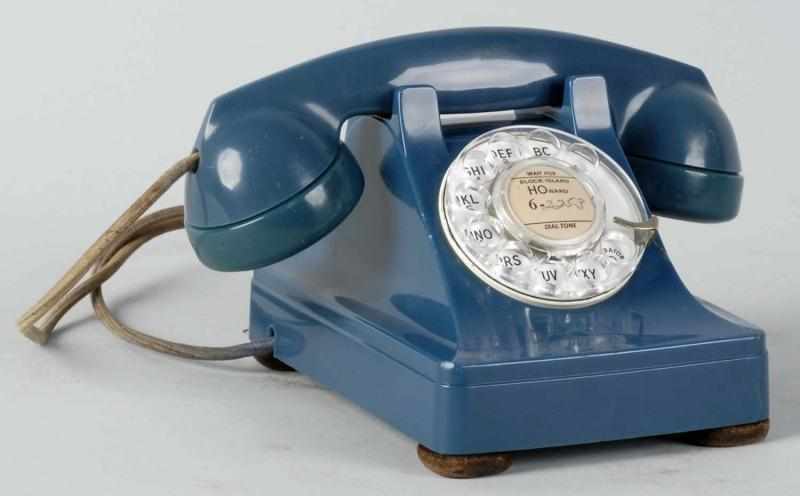 Appraisal: Blue Western Electric Telephone Description Shell and base dated Phone