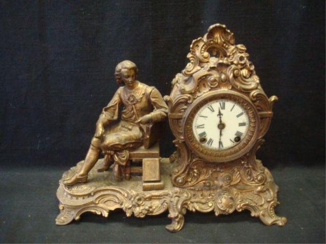 Appraisal: Gilt Metal Figural Clock Missing glass from face From a