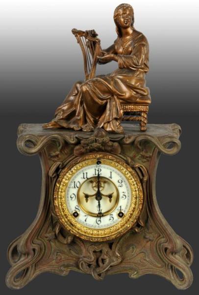 Appraisal: Metal Ansonia Time Strike Clock Description Art Nouveau style with