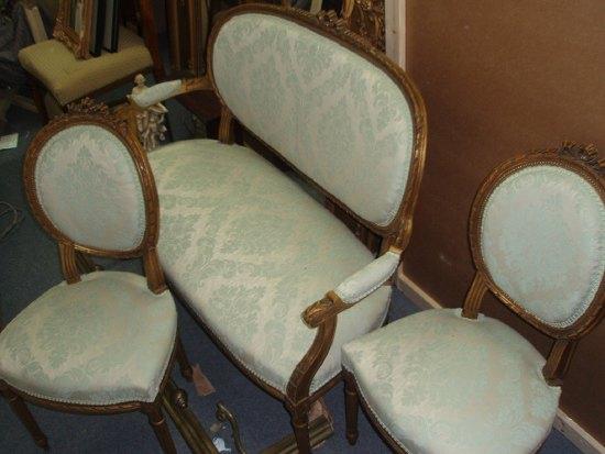 Appraisal: A Louis XVI style part salon suite comprising settee and