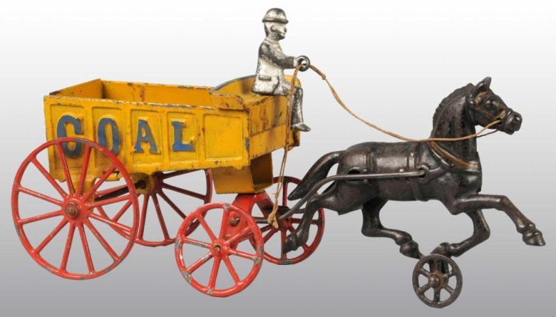 Appraisal: Cast Iron Hubley Horse-Drawn Coal Wagon Toy Description Includes one