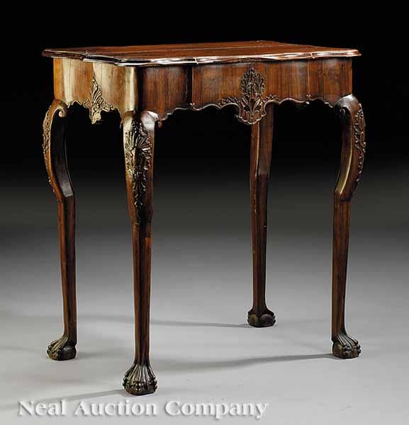 Appraisal: A Portuguese Rococo Carved Walnut Table late th c serpentine