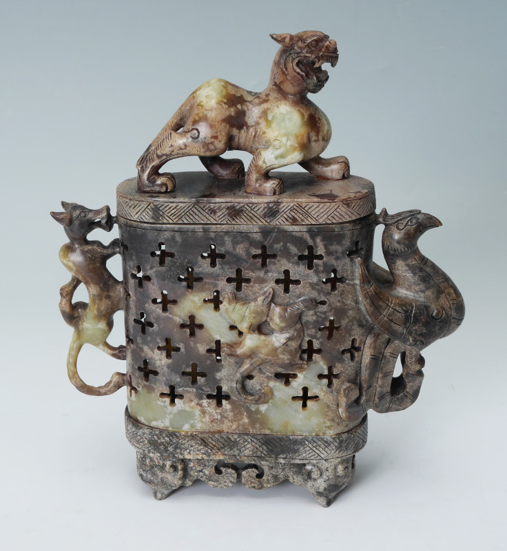 Appraisal: ORIENTAL SOAPSTONE COVERED CENSOR A mottle brown lidded censor with