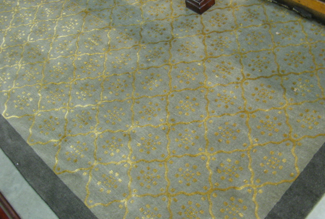 Appraisal: CUSTOM HAND WOVEN CARPET overall gold diapered decoration on gray