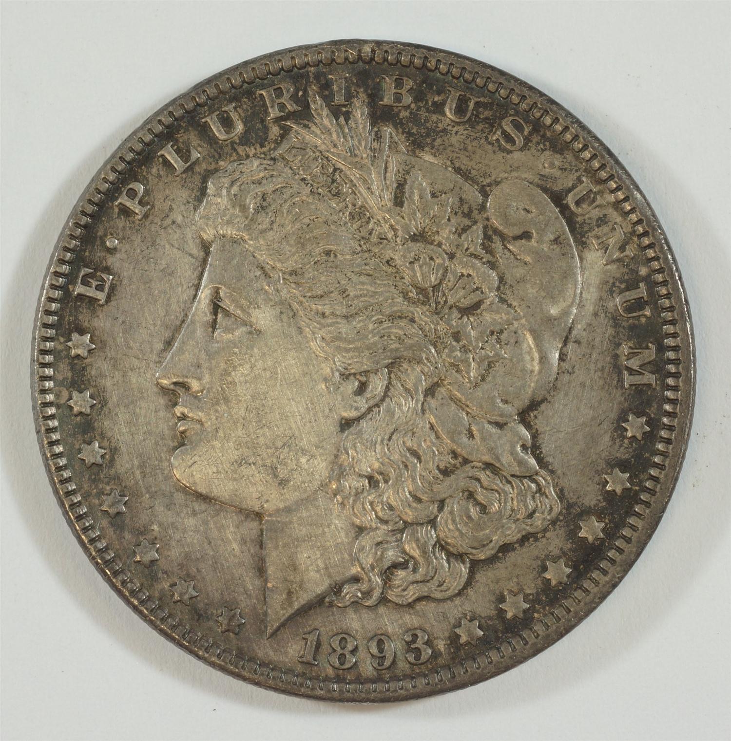 Appraisal: Morgan silver dollar light hairlines a tiny obverse rim bump