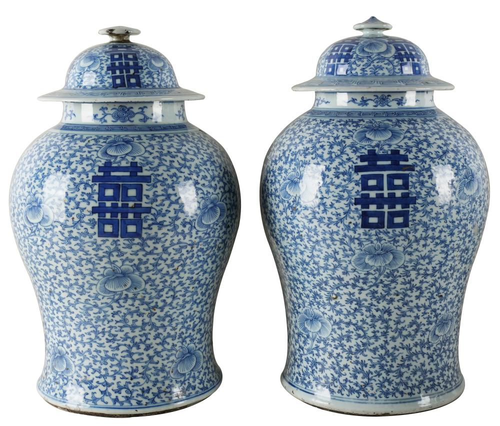 Appraisal: PAIR OF CHINESE BLUE WHITE PORCELAIN COVERED JARSeach with four-character