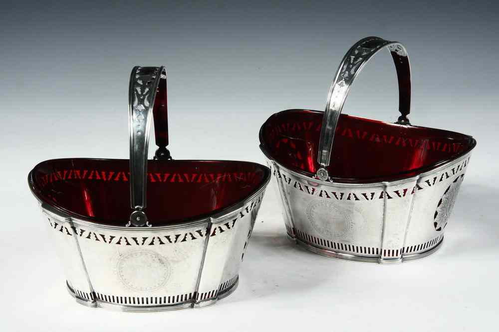 Appraisal: BASKETS - Pair of Sterling Regency style sweet-meat baskets with