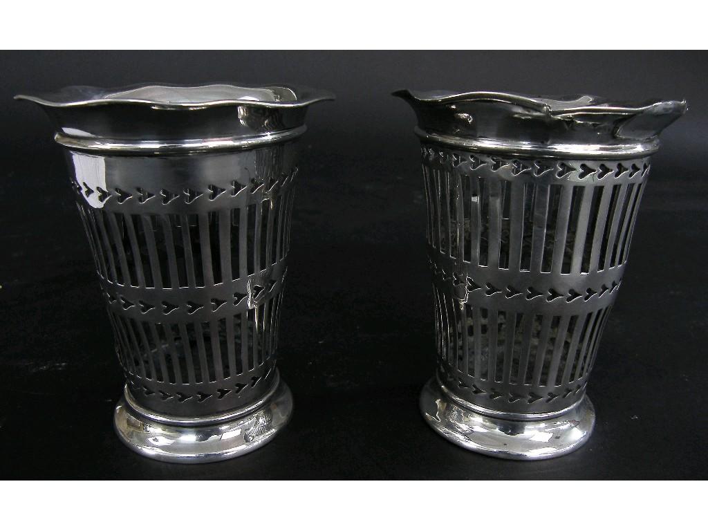 Appraisal: Pair of Edwardian flared vases the body pierced with geometric