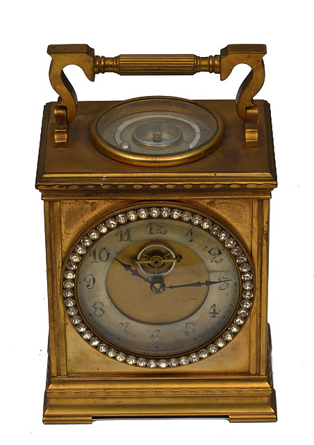 Appraisal: A CONTINENTAL MANTLE TIMEPIECE with a gilt case with hinged