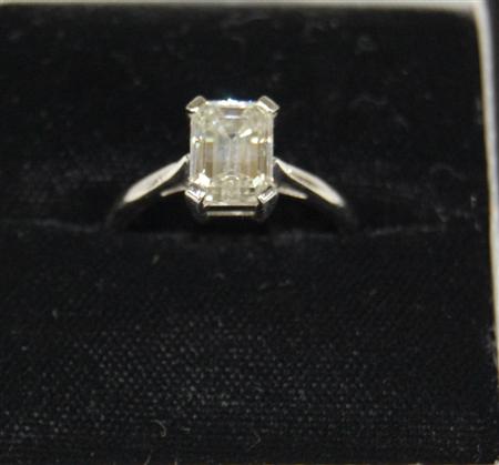 Appraisal: A contemporary platinum mounted diamond single-stone ring corner claw set