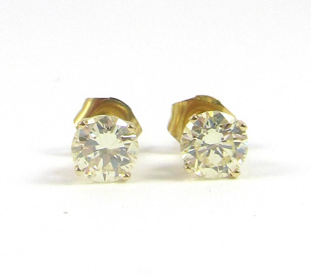 Appraisal: PAIR OF DIAMOND AND FOURTEEN KARAT GOLD EAR STUDS each