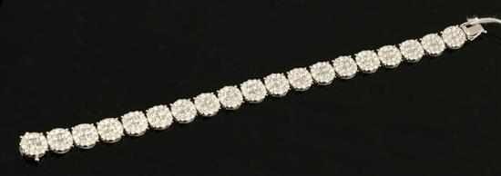 Appraisal: A diamond bracelet Comprising nineteen circluar links each set with