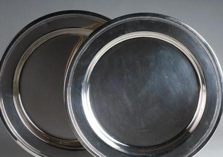 Appraisal: PAIR OF AMERICAN SILVER CIRCULAR TRAYS REED BARTON Each surrounded