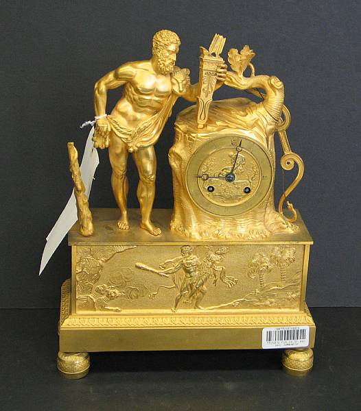 Appraisal: An Empire gilt bronze figural mantel clock early th century