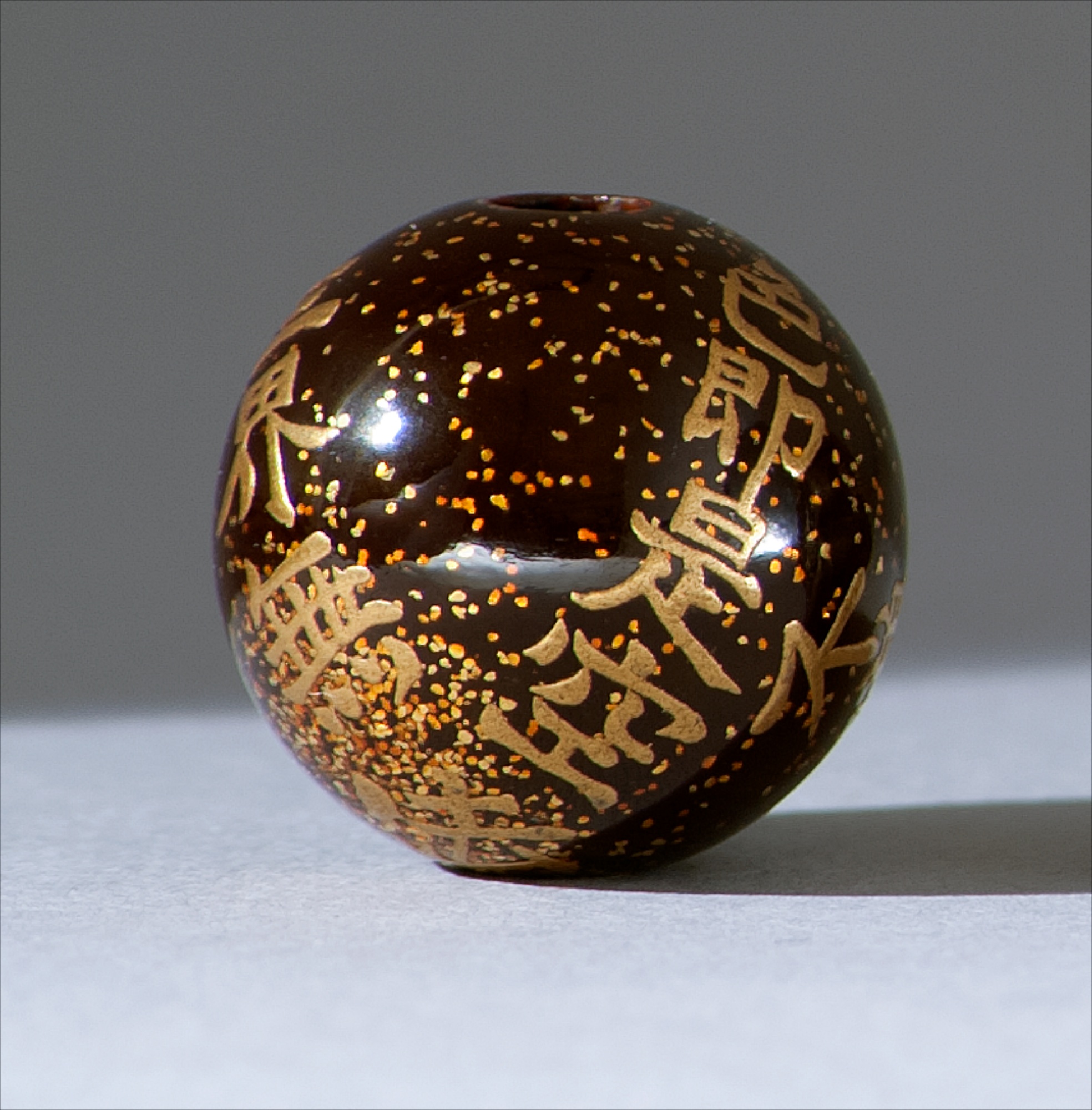 Appraisal: GOLD LACQUER OJIME th CenturyBy Tomizo Saratani In ball form