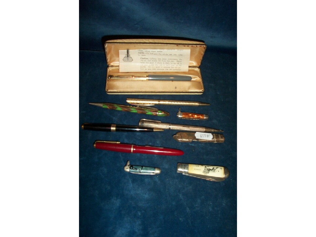 Appraisal: A small collection including two fountain pens propelling pencil penknives