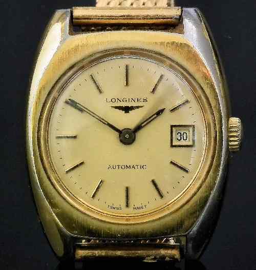 Appraisal: A modern lady's Longines automatic wristwatch in gilt coloured metal