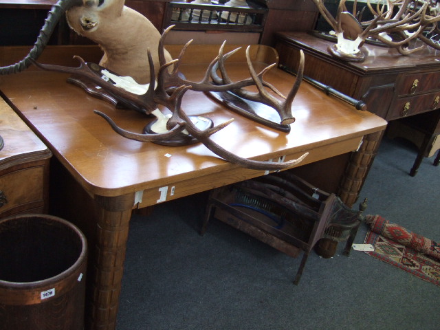 Appraisal: A th century oak desk by Eliel Saarinen raised on