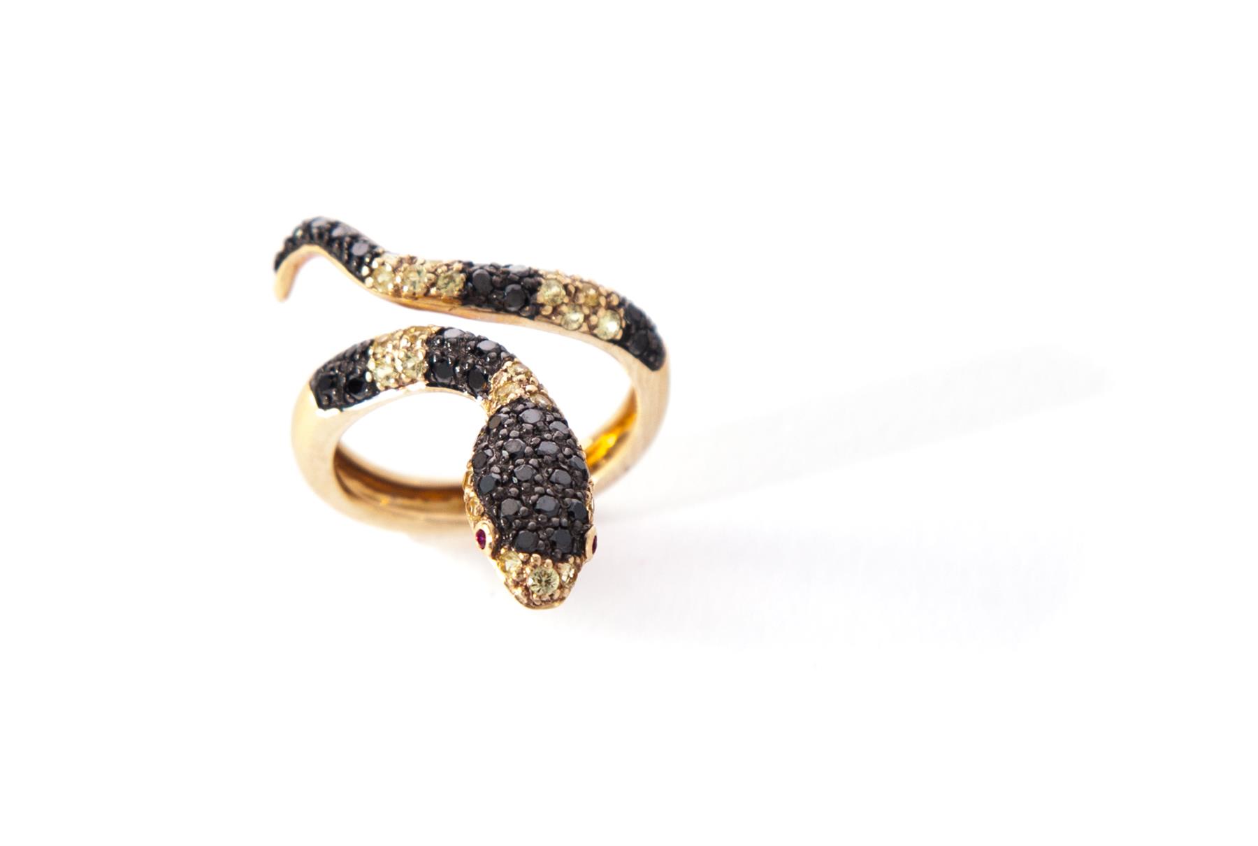 Appraisal: GOLD AND DIAMOND SERPENT RING American st century Stamped K