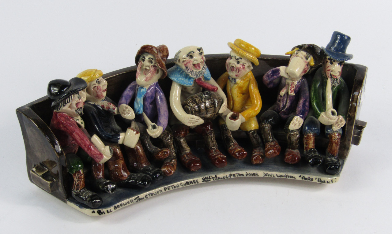 Appraisal: A Will Young Widecombe pottery figure group of Uncle Tom