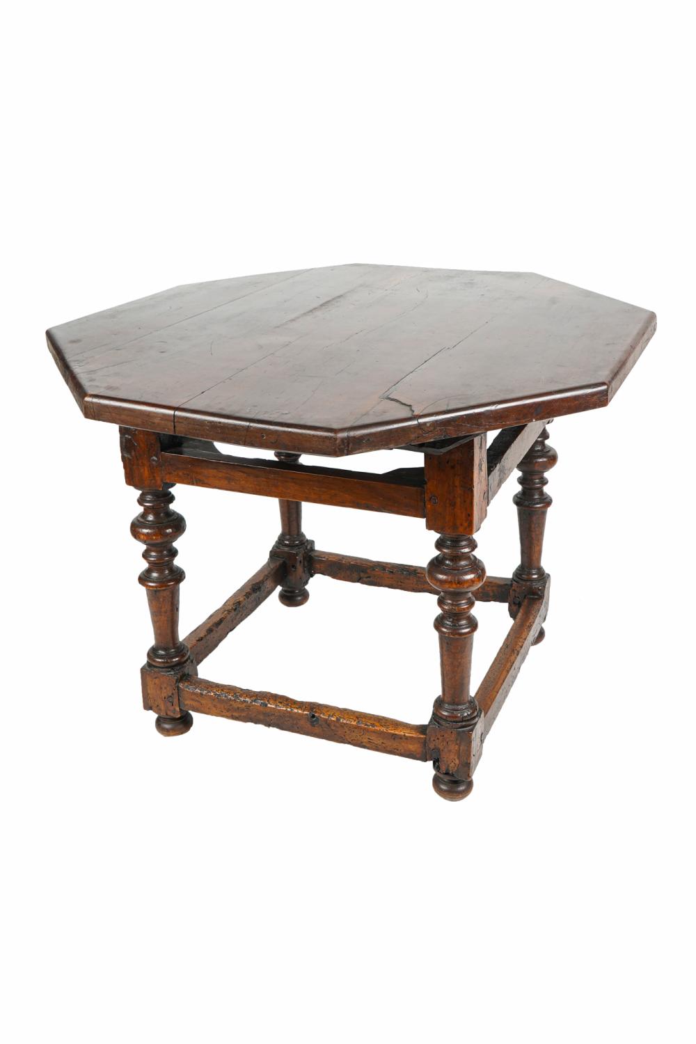 Appraisal: TUSCAN STYLE WALNUT OCTAGONAL TABLEProvenance A Michael Smith installation inches