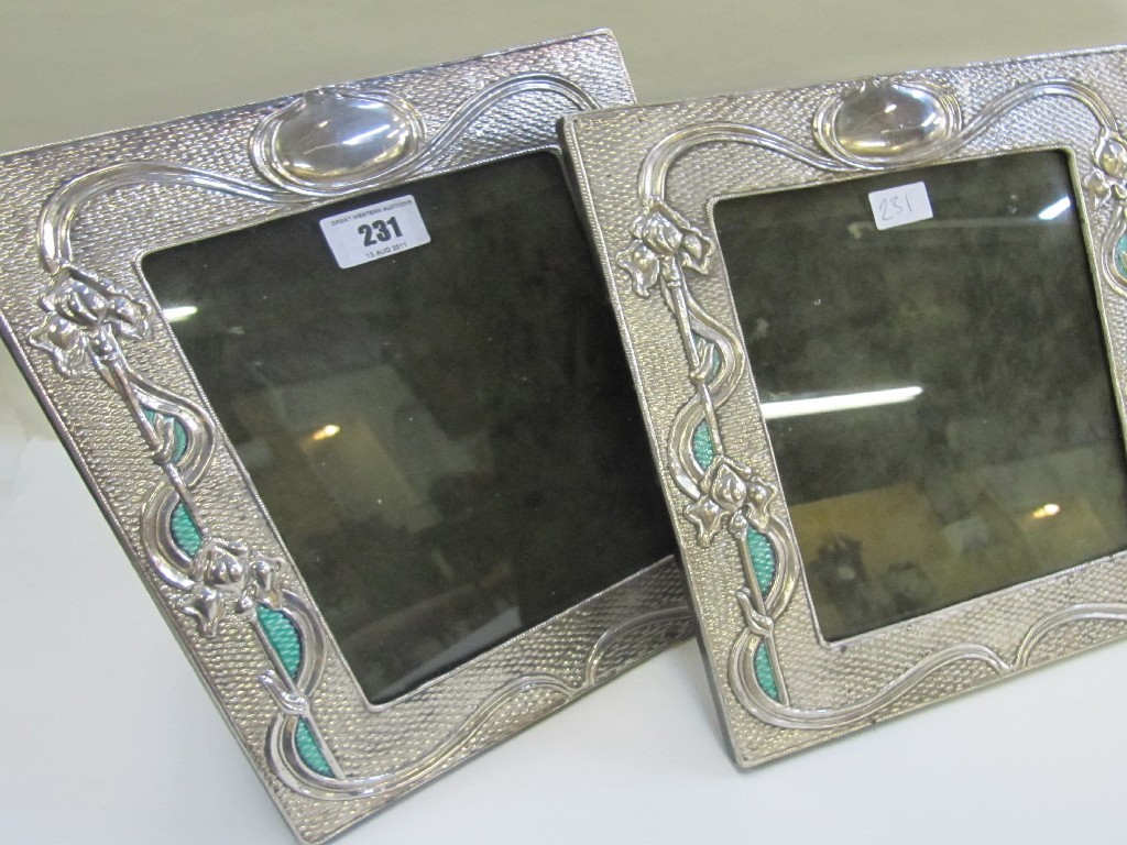 Appraisal: Pair of Art Nouveau style silver and enamel mounted photo