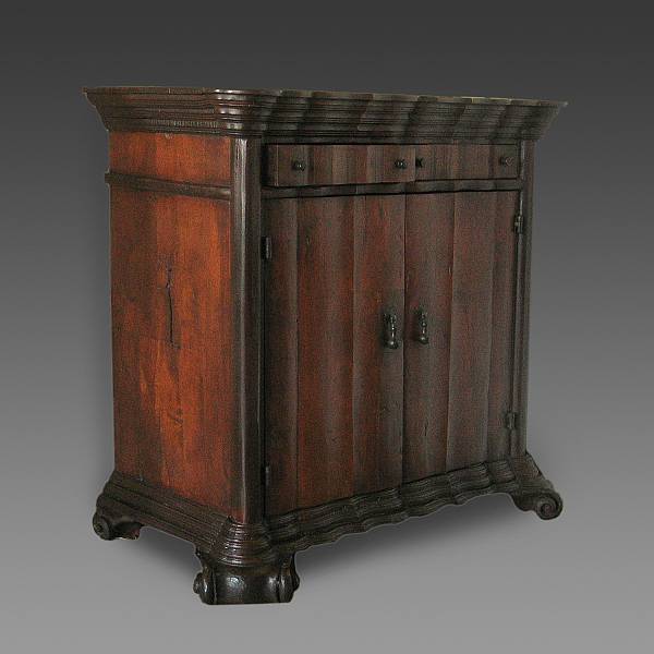 Appraisal: A pair of Tuscan Baroque style walnut credenza height in