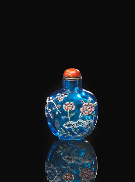 Appraisal: A molded and enameled translucent blue glass snuff bottle -