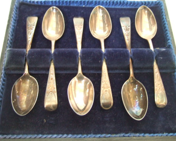 Appraisal: A set of six silver coffee spoons with engraved decoration