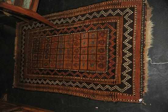 Appraisal: A BROWN AFGHAN RUG