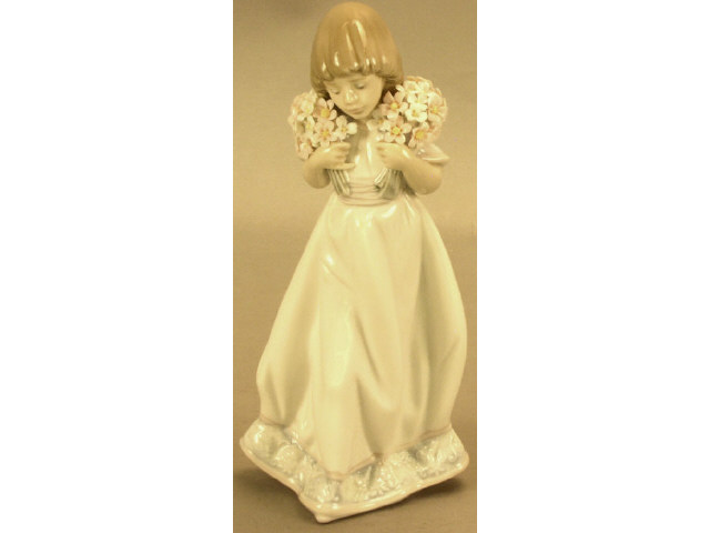 Appraisal: Lladro Spring Bouquets figurine in excellent condition measures tall Estimate