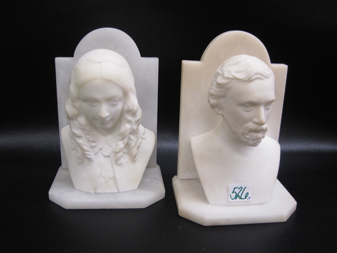 Appraisal: PAIR WHITE MARBLE SCULPTED BOOKENDS c 's male and female