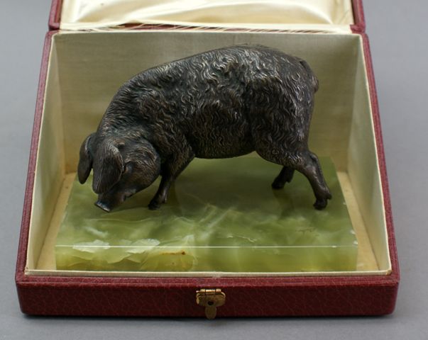 Appraisal: An Austrian cast silvered bronze figure of a pig by