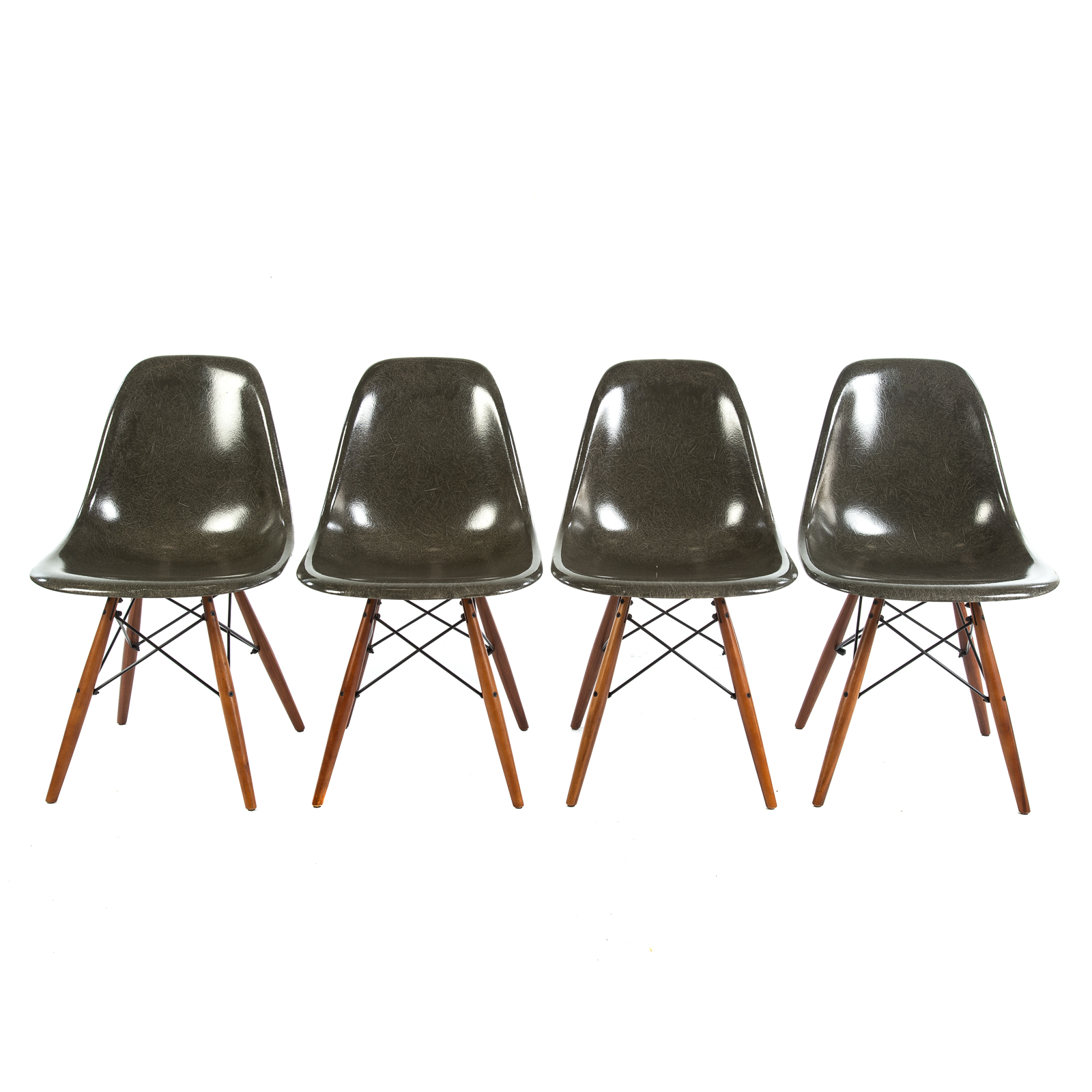 Appraisal: FOUR MID-CENTURY STYLE MOLDED FIBERGLASS CHAIRS On wood and metal