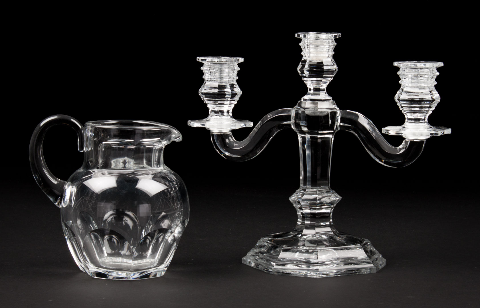 Appraisal: Baccarat crystal candelabra and pitcher three-light candelabra in H and