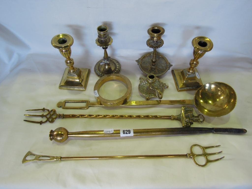 Appraisal: A collection of brassware including two pairs of candlesticks chamber