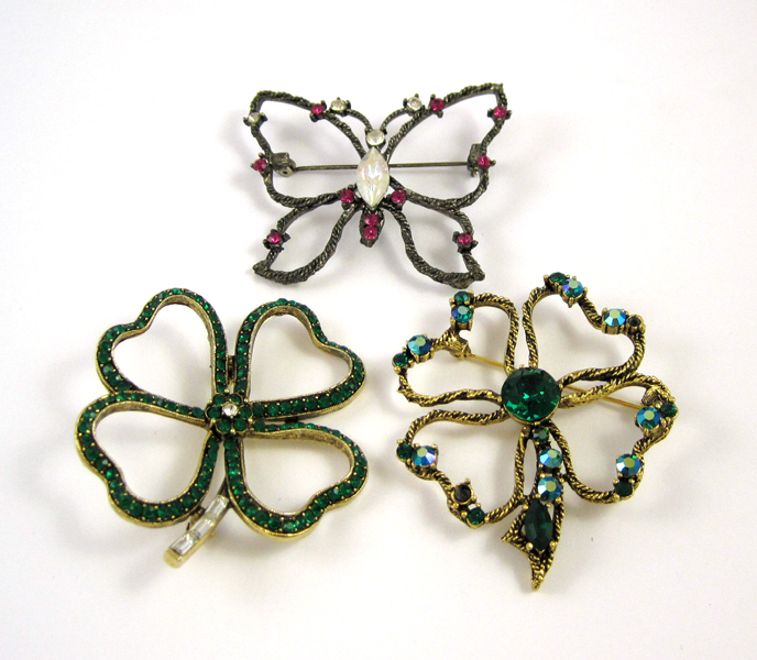 Appraisal: THREE VINTAGE WEISS COSTUME BROOCH PINS including two four-leaf clover