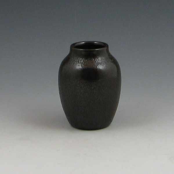 Appraisal: Rookwood vase from with unusual brown curdled glaze Marked with