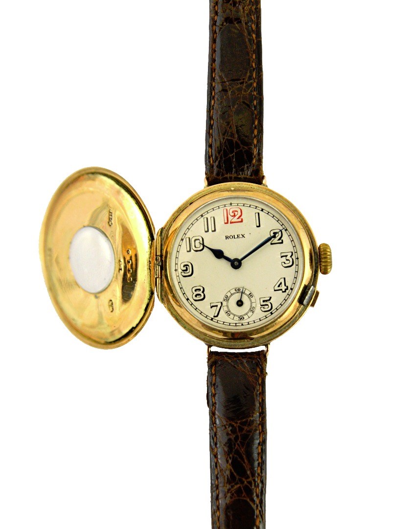 Appraisal: A ct gold circular half hunting cased Rolex wristwatch the