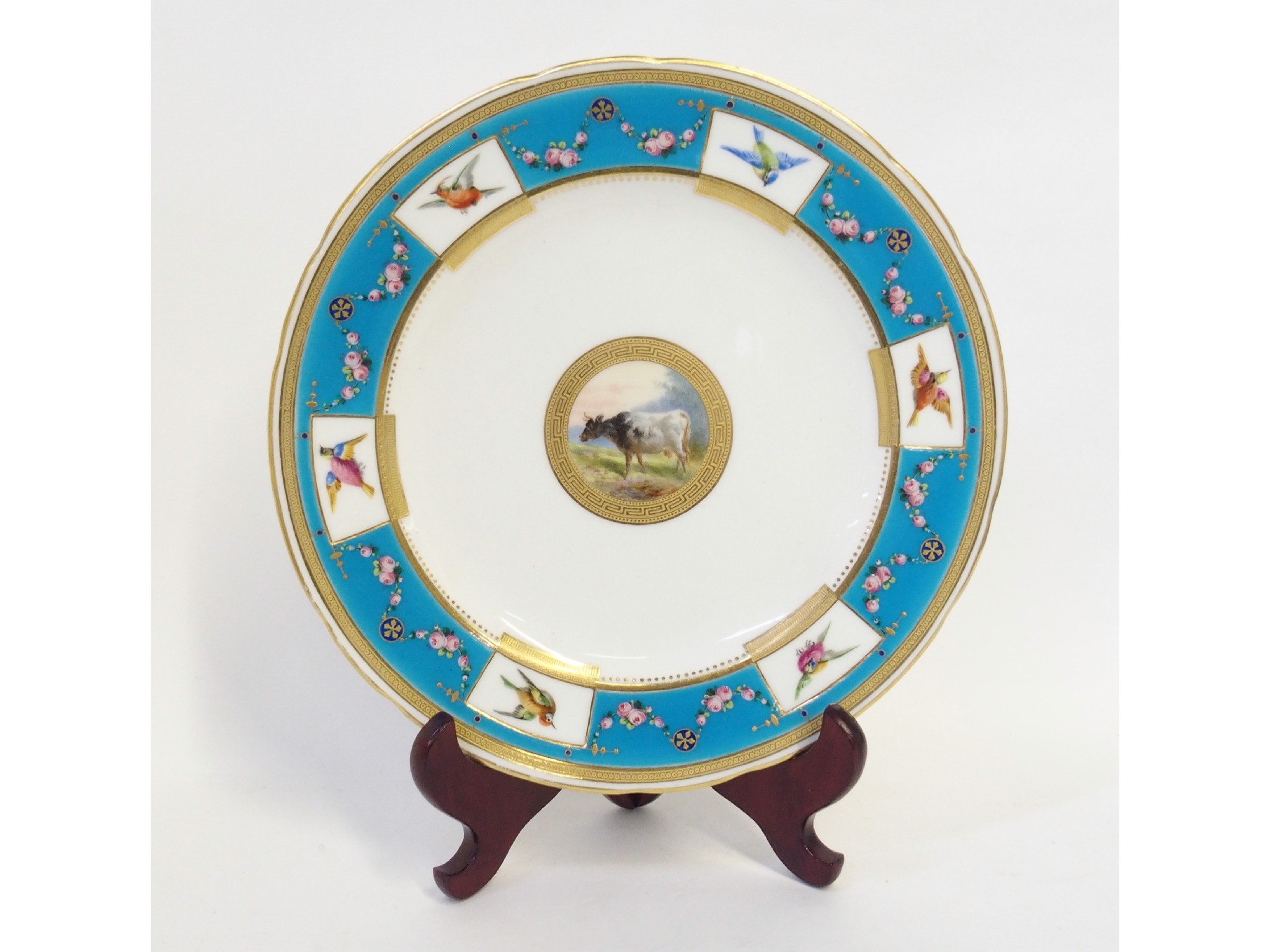 Appraisal: Minton cabinet plate the blue border with painted panels of