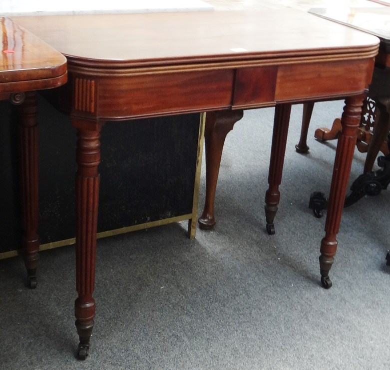 Appraisal: A late George III mahogany 'D' shaped foldover card table