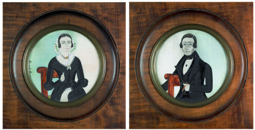 Appraisal: Pair of watercolor on ivory miniature portraits of a husband