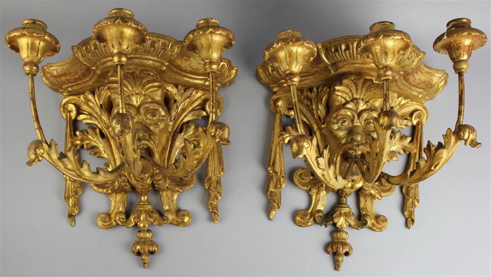 Appraisal: PAIR OF CONTINENTAL GILTWOOD THREE-LIGHT WALL SCONCE BRACKETS early th