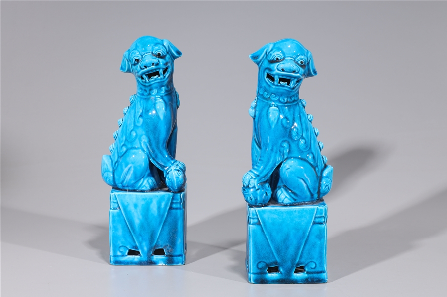 Appraisal: Pair of Chinese blue glazed ceramic foo lions overall good